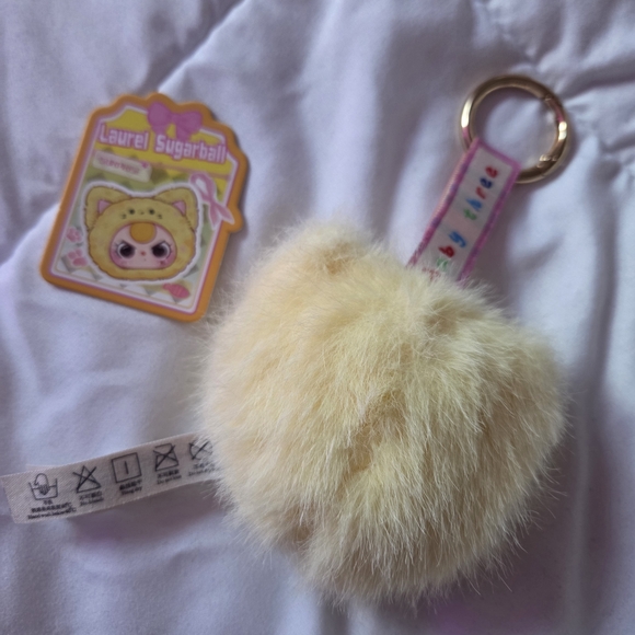 Fluffy Yellow Keychain - Picture 2 of 4